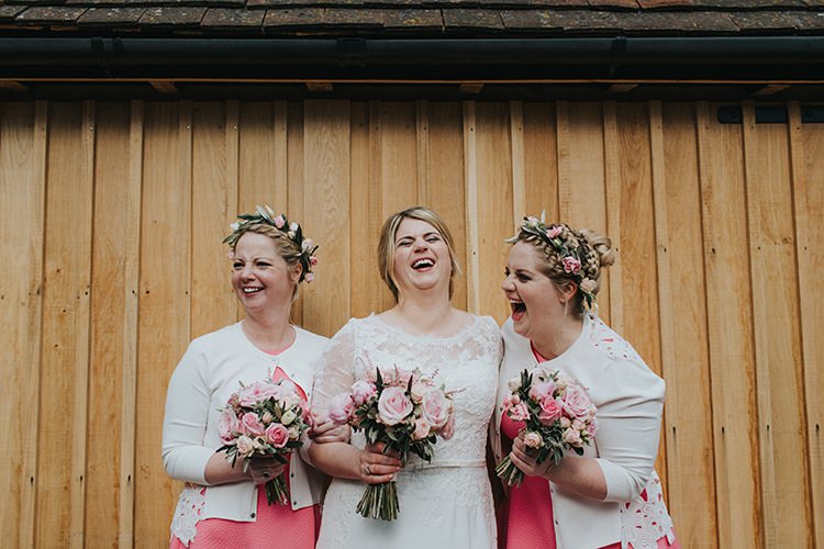 Coral Pink Bridesmaid Dresses Flower Crowns Cardigans Magical Spring Barn Wedding http://www.ireneyapweddings.com/