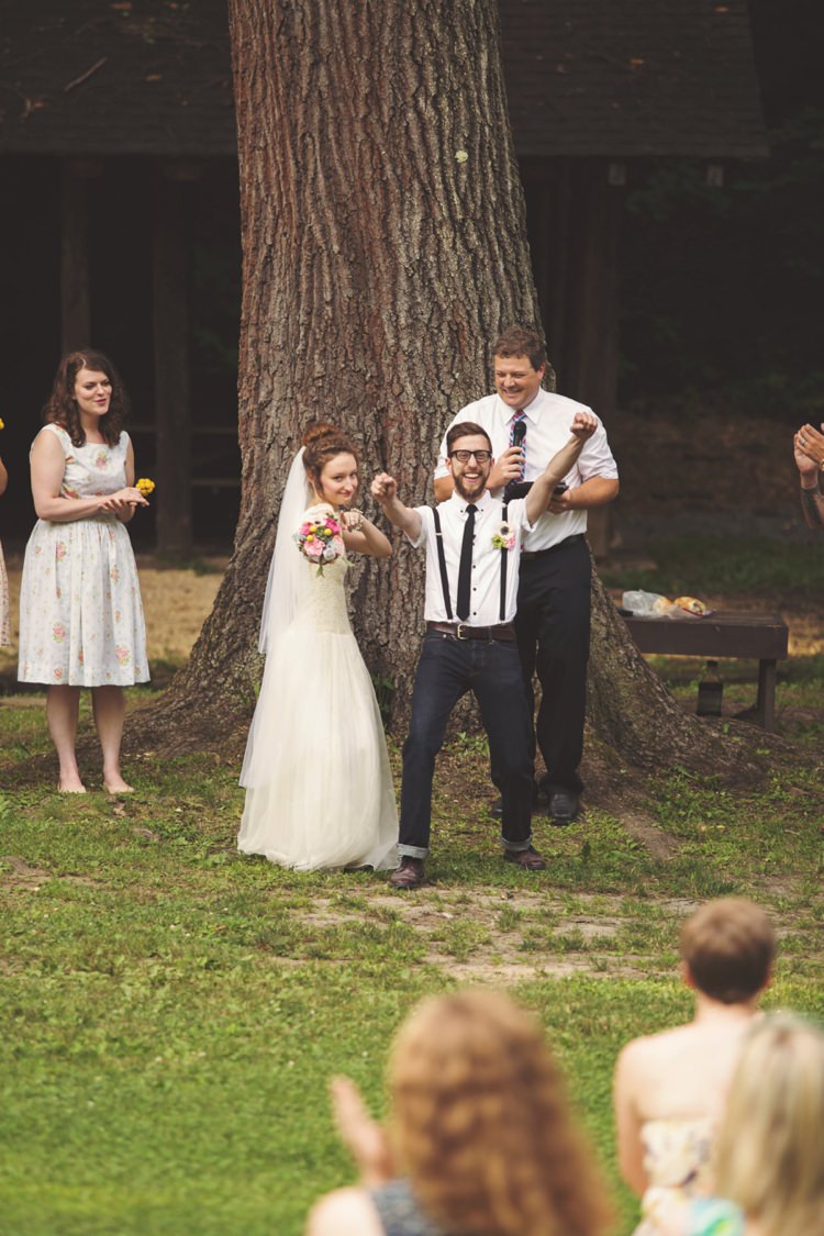 Outdoor Ceremony Bride Cap Sleeve Beaded Gown Veil Felt Floral Bouquet Groom White Shirt Suspenders Jeans Celebrant Tree Celebrate Artistic Whimsical Woodland Wedding http://www.adlivcollective.com/