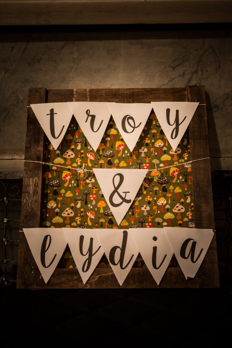 Reception Wooden Bunting Sign Mushroom Background Artistic Whimsical Woodland Wedding http://www.adlivcollective.com/