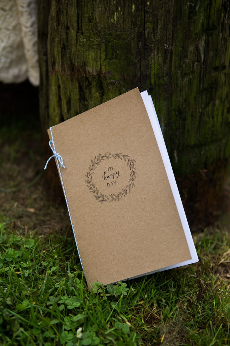 Ceremony Booklet Blue Ribbon Cardboard Tree Grass Artistic Whimsical Woodland Wedding http://www.adlivcollective.com/