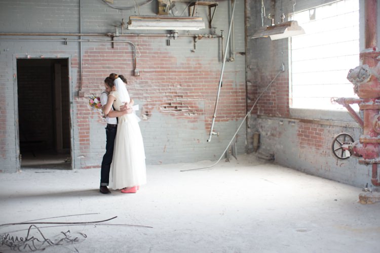 First Look Groom Bride Hug Warehouse Artistic Whimsical Woodland Wedding http://www.adlivcollective.com/