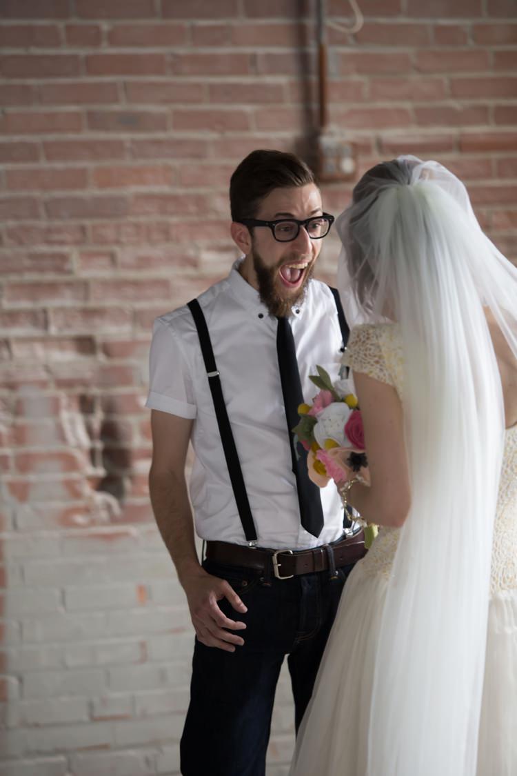 First Look Groom White Shirt Suspenders Black Tie Jeans Glasses Bride Veil Felt Floral Bouquet Artistic Whimsical Woodland Wedding http://www.adlivcollective.com/