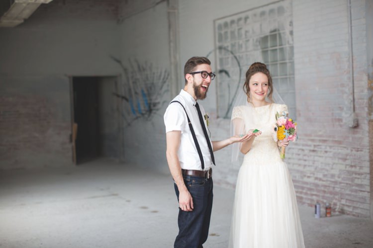 First Look Groom White Shirt Suspenders Black Tie Jeans Bride Cap Sleeve Beaded Bridal Gown Veil Felt Floral Bouquet Artistic Whimsical Woodland Wedding http://www.adlivcollective.com/