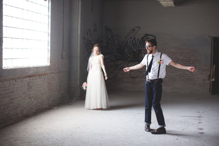 First Look Groom White Shirt Suspenders Black Tie Felt Button Hole Jeans Bride Cap Sleeve Beaded Bridal Gown Veil Pink Shoes Felt Floral Bouquet Artistic Whimsical Woodland Wedding http://www.adlivcollective.com/