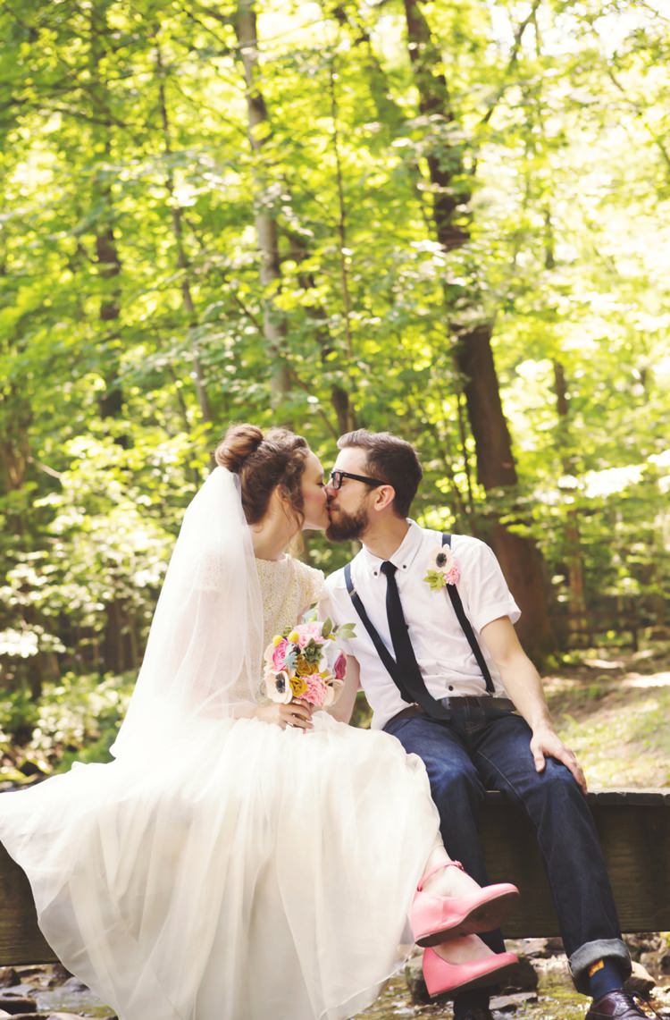 Bride Cap Sleeve Beaded Gown Veil Felt Floral Bouquet Anemone Pink Shoes Groom White Shirt Black Suspenders Tie Jeans Glasses Button Hole Bridge Trees Artistic Whimsical Woodland Wedding http://www.adlivcollective.com/