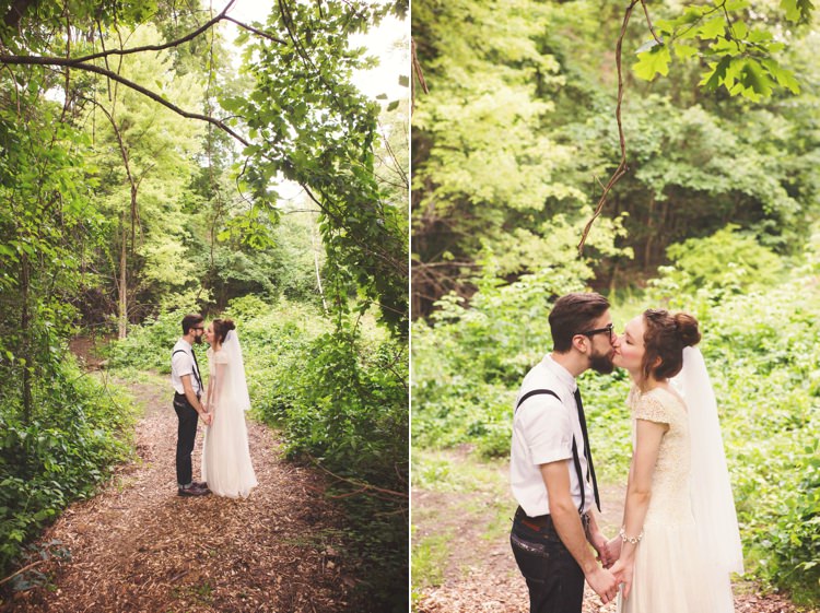 Bride Cap Sleeve Beaded Bridal Gown Veil Bun Hairstyle Groom White Shirt Black Suspenders Tie Jeans Glasses Trees Sunlight Kiss Artistic Whimsical Woodland Wedding http://www.adlivcollective.com/
