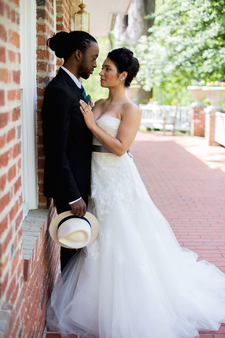Groom Black Suit Blue Check Tie White Fedora Bride Strapless Lace Tulle Gown Sage Sash Bricks Outdoors Romantic Vintage Wedding Ideas http://katymurrayphotography.com/