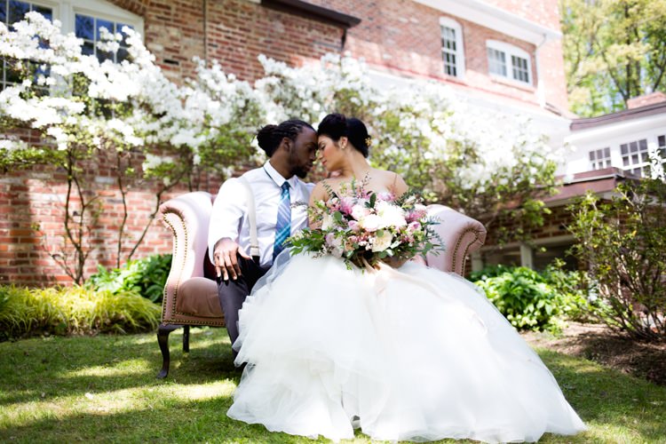 Groom Blue Striped Tie Suspenders Bride Strapless Lace Tulle Gown Pink Green Bouquet Peonies Tea Roses Eucalyptus Florals Blush Sofa Outdoors Azaleas Romantic Vintage Wedding Ideas http://katymurrayphotography.com/