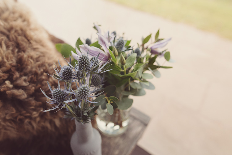 Bottle Flowers Foliage Thistles Quirky Rustic Natural Winter Wedding http://www.rebeccadouglas.co.uk/
