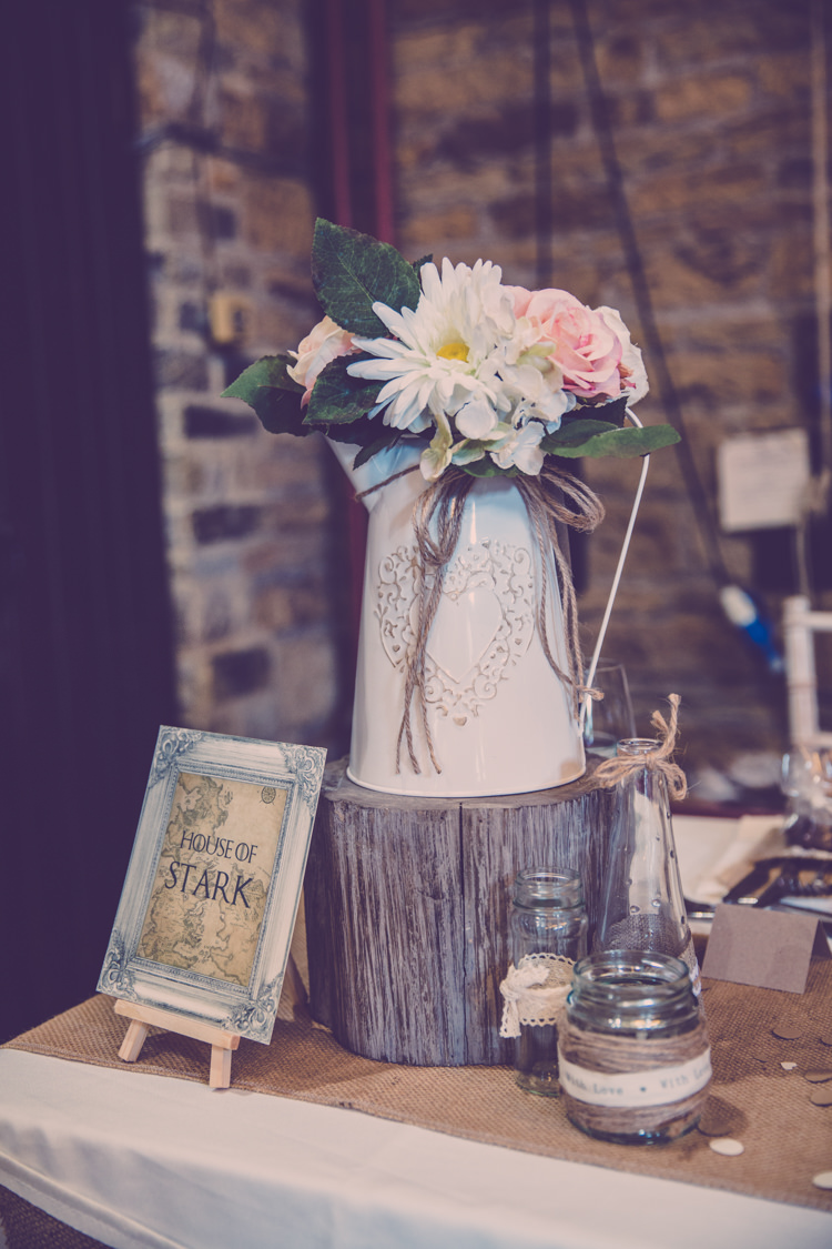 Jug Flowers Centrepiece Log Decor Alternative Game of Thrones Fete Wedding http://hayleybaxterphotography.com/