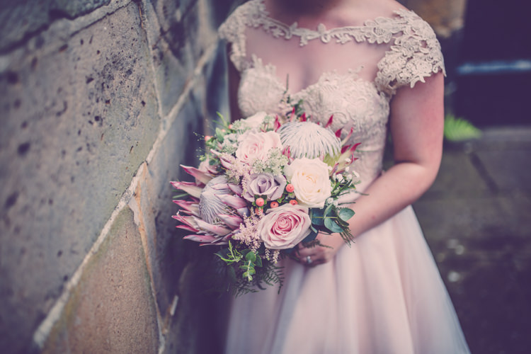 Bride Bridal Bouquet Flowers Protea Pastel Pink Roses Alternative Game of Thrones Fete Wedding http://hayleybaxterphotography.com/