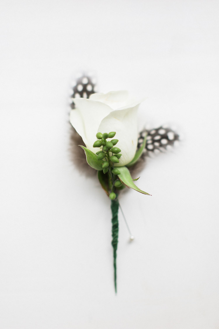 White Rose Feather Buttonhole Beautiful Barn Bird Wedding http://www.melissabeattie.com/