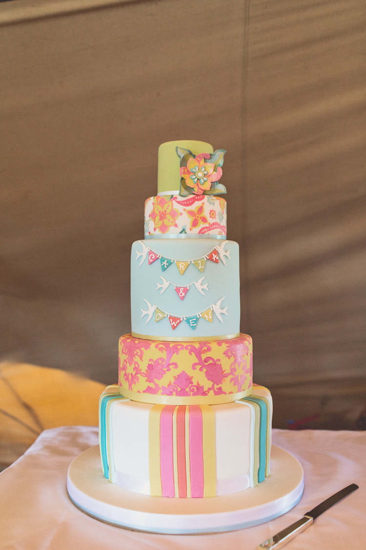 Colourful Pastel Bunting Cake Stripes Flowers DIY Tipi Camping Wedding http://www.wearetheclarkes.com/