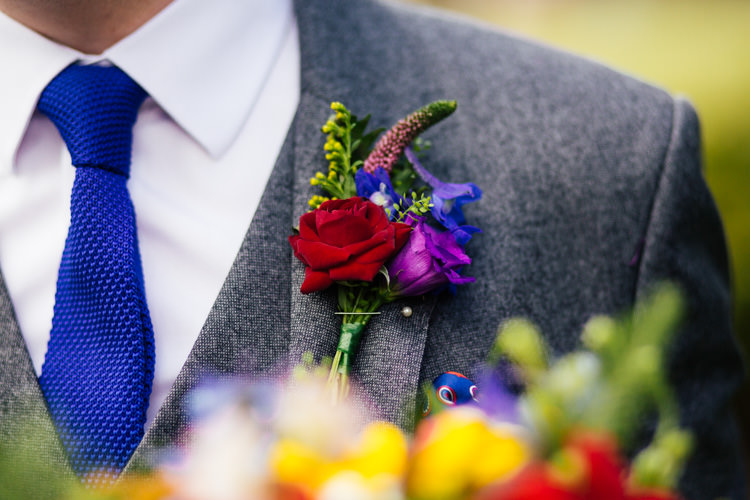 Buttonhole Groom Colourful Red Rose Knitted Tie Blue Multicoloured Fun Creative Wedding http://www.catlaneweddings.com/