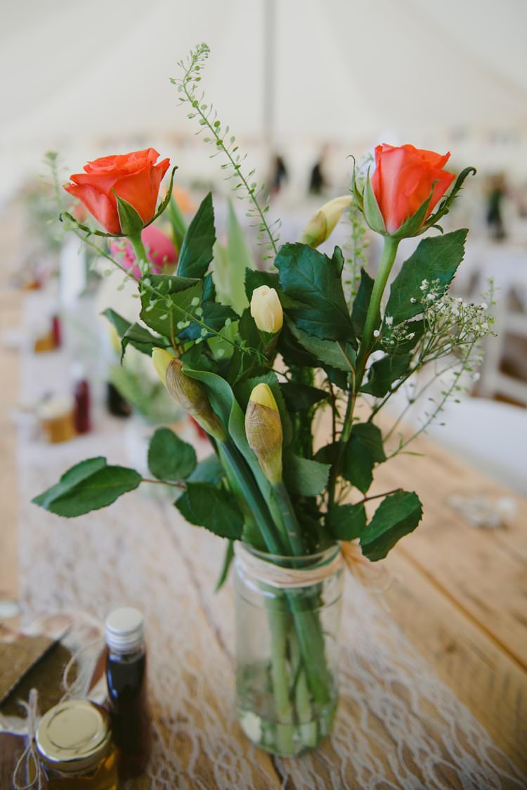 Colourful Jar Flowers Rose Jar Centrepiece Indie Rustic Beach Marquee Wedding http://www.abiriley.co.uk/