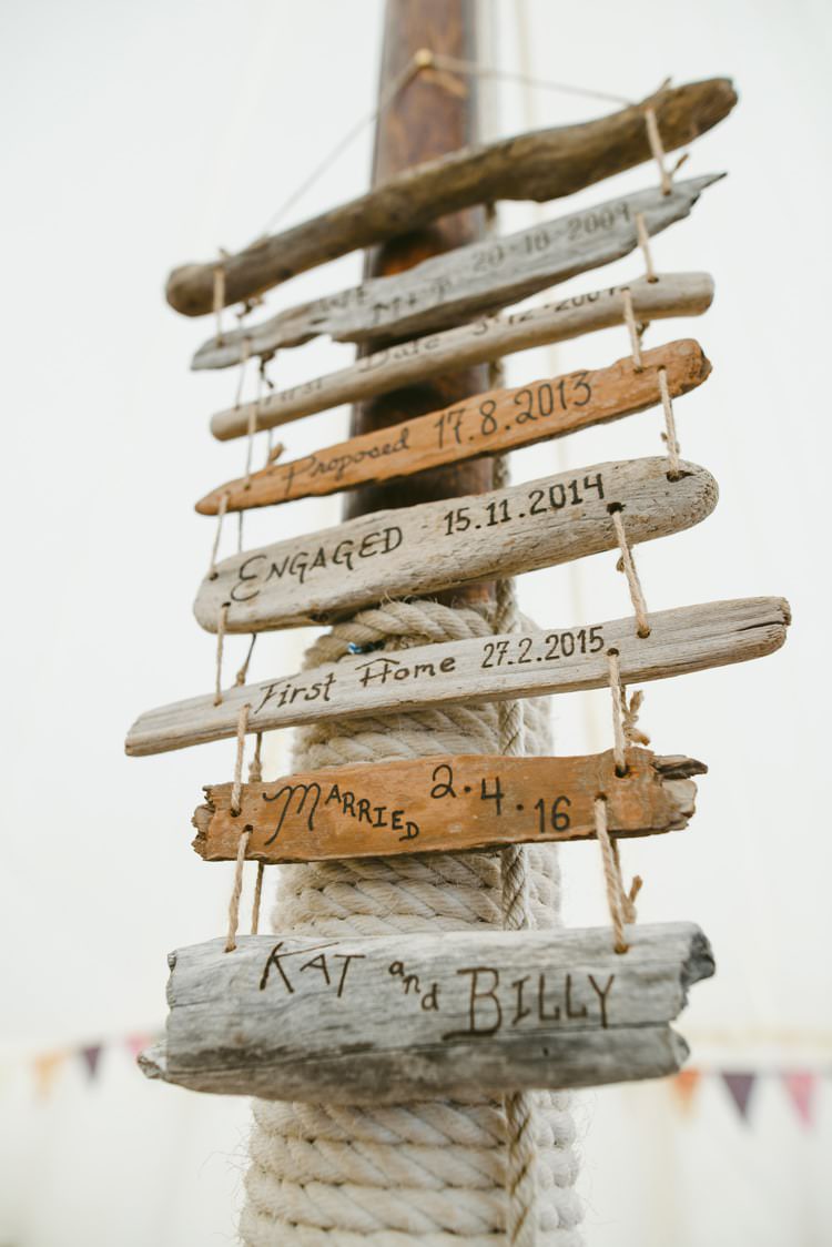 Driftwood Sign Post Indie Rustic Beach Marquee Wedding http://www.abiriley.co.uk/