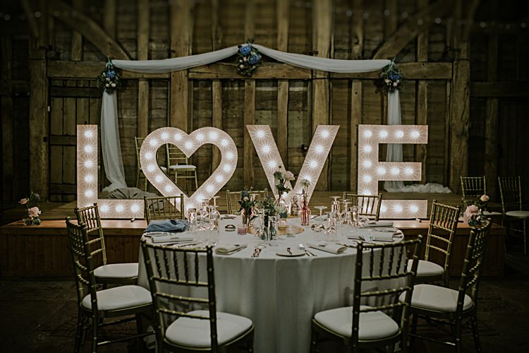 LOVE Letter Lights Pretty Pale Blue Gold Fairy Lit Barn Wedding http://lolarosephotography.com/