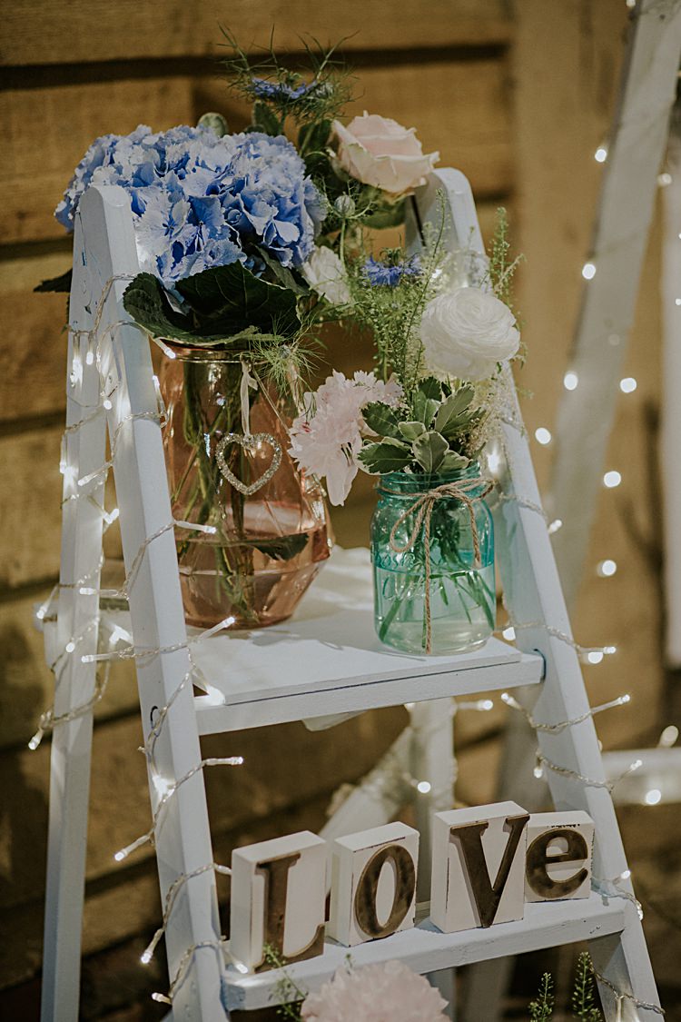 Vase Votives Centrepiece Decor Flowers Pink Candles Ladder Fairy Lights Pretty Pale Blue Gold Fairy Lit Barn Wedding http://lolarosephotography.com/