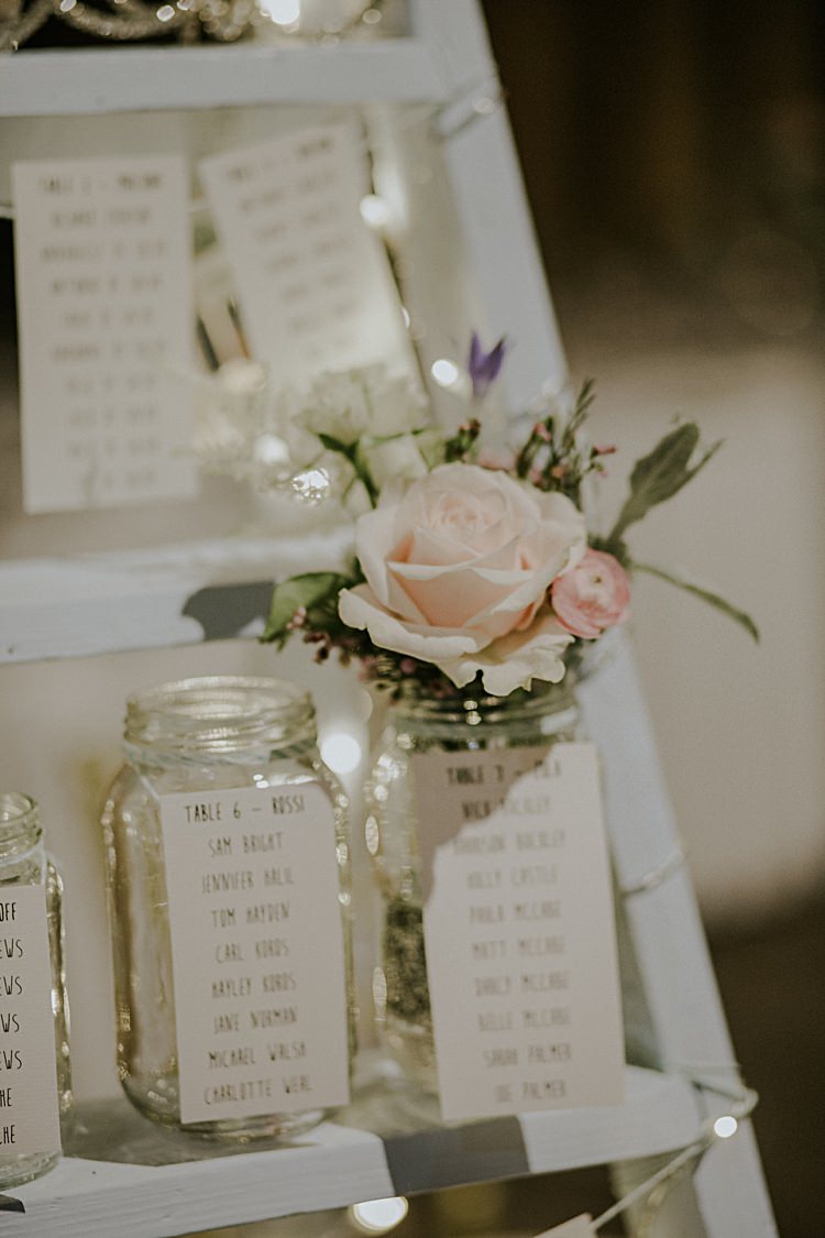 Ladder Jar Flowers Seating Plan Table Chart Fairy Lights Pretty Pale Blue Gold Fairy Lit Barn Wedding http://lolarosephotography.com/ 