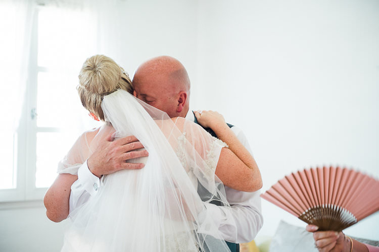 Bride Beaded Sleeved Enzoani Bridal Gown Bun Hairstyle Veil Dad Hug St Tropez Destination Wedding http://www.gemmamcauleyphotography.com/
