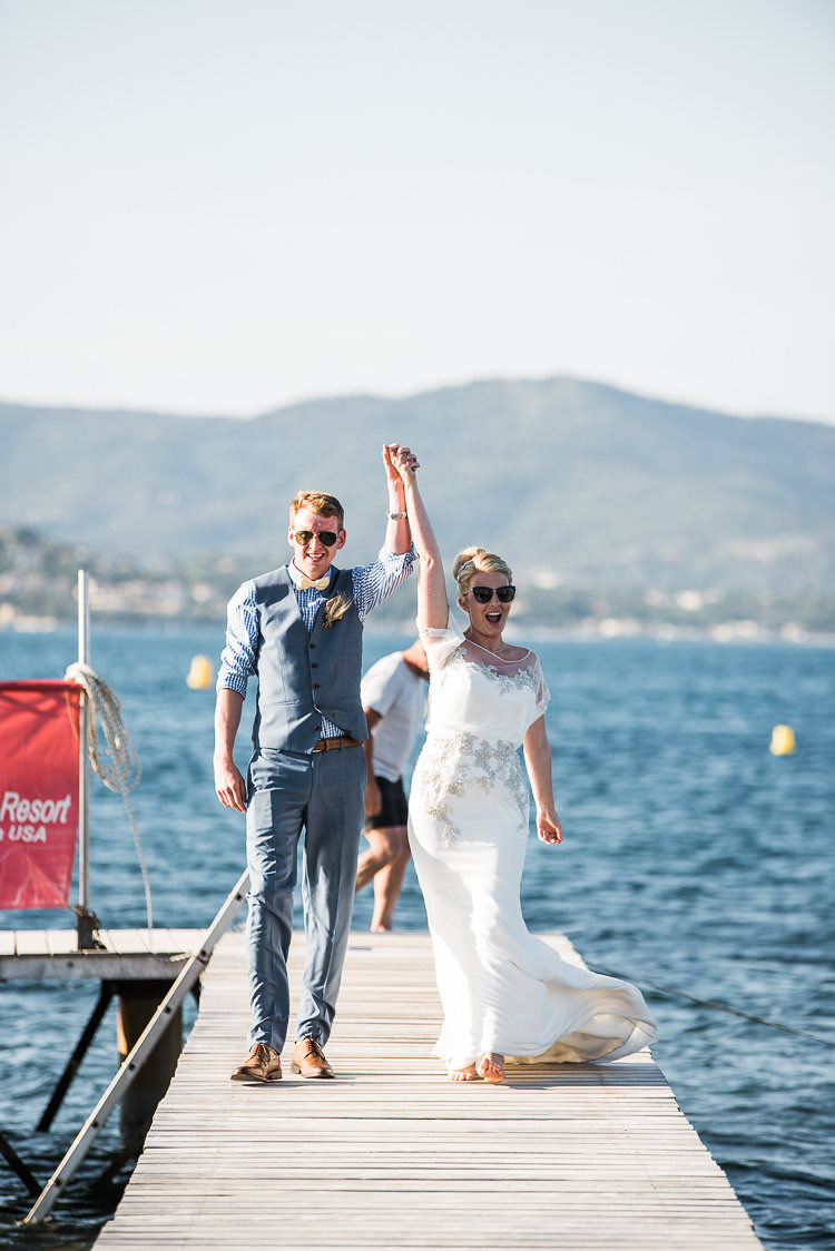 Reception Arrival Groom Blue Next Checked Shirt Vest Pants Cream Bowtie Bride Beaded Sleeved Enzoani Bridal Gown Pier Water St Tropez Destination Wedding http://www.gemmamcauleyphotography.com/