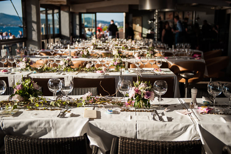 Reception Table Settings Wooden Sign Pink White Floral Centrepiece Water View St Tropez Destination Wedding http://www.gemmamcauleyphotography.com/