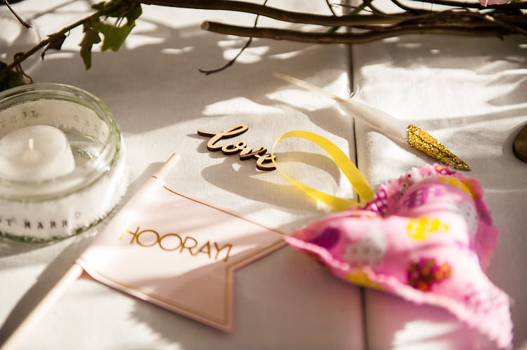 Reception Table Wooden Sign Candle Pink Heart Glitter Feather Hooray Flag St Tropez Destination Wedding http://www.gemmamcauleyphotography.com/