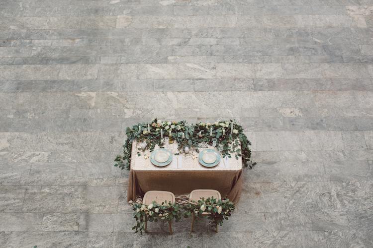 Table Setting Champagne Sequin Tablecloth Cream Blush Roses Greenery Flowers Decorated Chairs Gold Prism Candlesticks Light Blue Plates Breathtaking Lake Como Wedding Ideas http://lillyred.it/