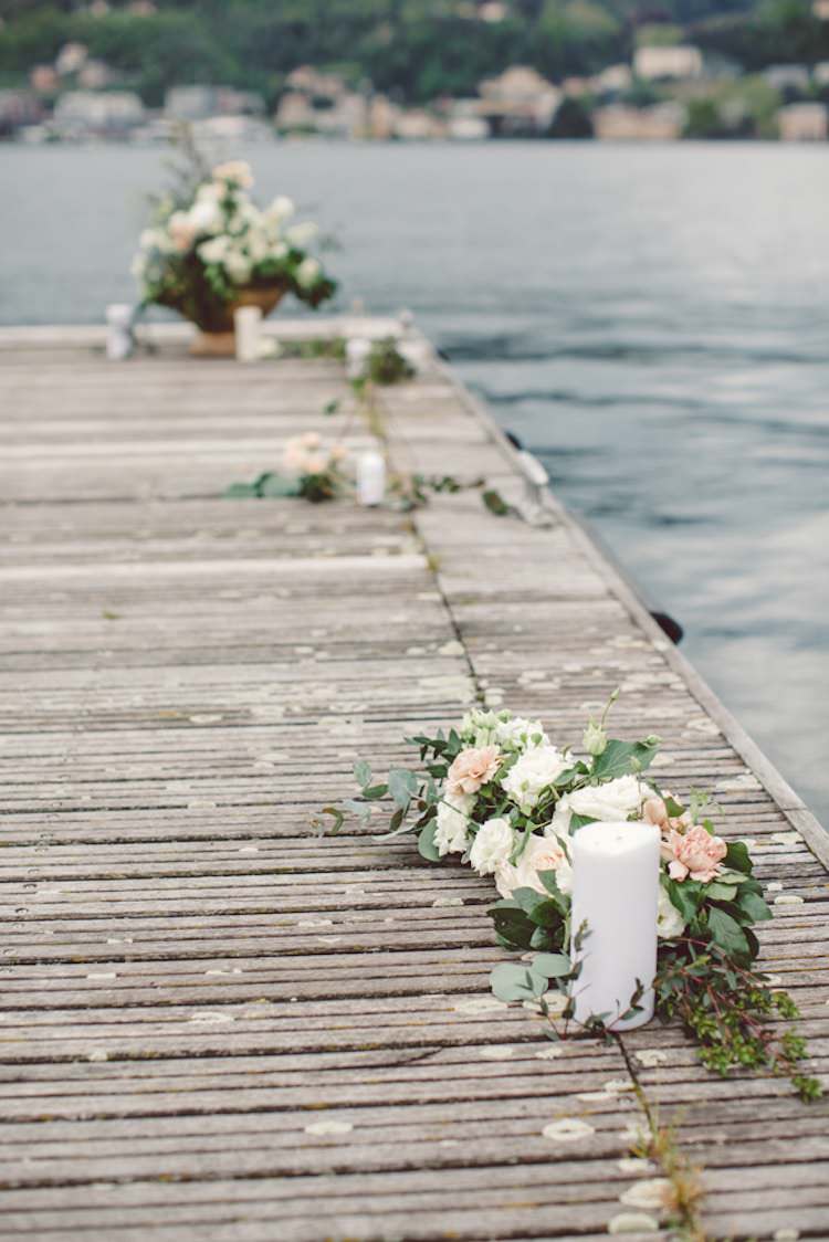 Outdoor Ceremony Idea Pier Lake Flowers Cream Blush Roses Greenery Candles Breathtaking Lake Como Wedding Ideas http://lillyred.it/