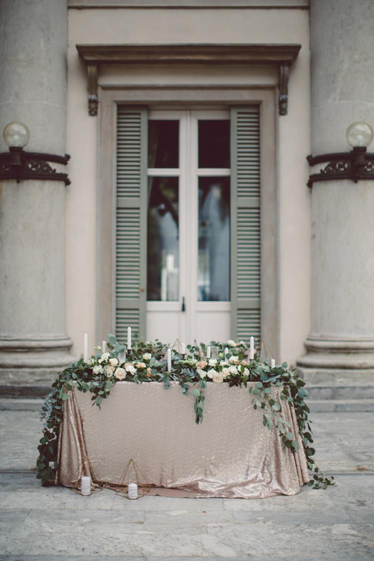 Table Setting Champagne Sequin Tablecloth Cream Blush Roses Greenery Candlesticks Vila Geno Venue Breathtaking Lake Como Wedding Ideas http://lillyred.it/