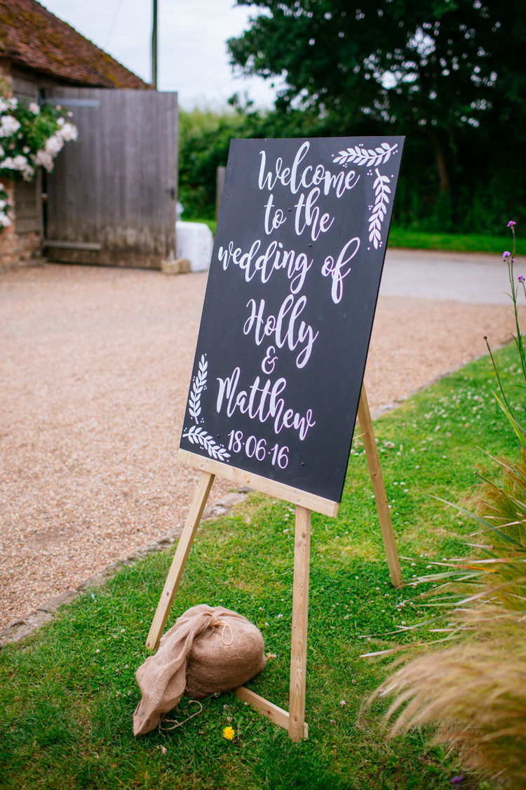Black Chalk Board Sign DIY Easel Whimsical Peaches Mint Stylish Floral Wedding http://www.sarahleggephotography.co.uk/