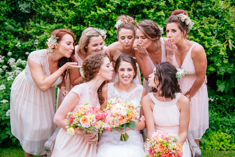 Mismatched Pink Bridesmaid Dresses Peaches Mint Stylish Floral Wedding http://www.sarahleggephotography.co.uk/