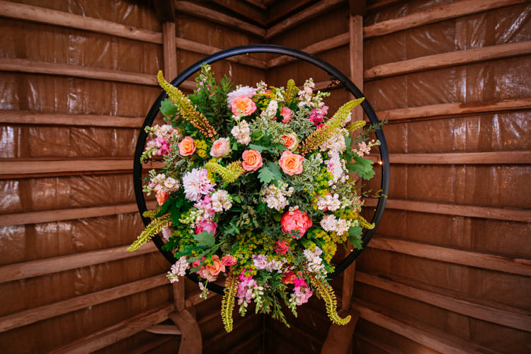 Flower Arrangement Hanging Ceiling Peaches Mint Stylish Floral Wedding http://www.sarahleggephotography.co.uk/