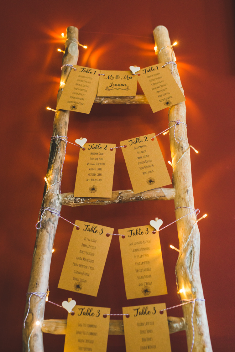 Wooden Ladder Seating Plan Chart Table Gold Sequin Outdoor Humanist Wedding http://www.emmahillierphotography.com/