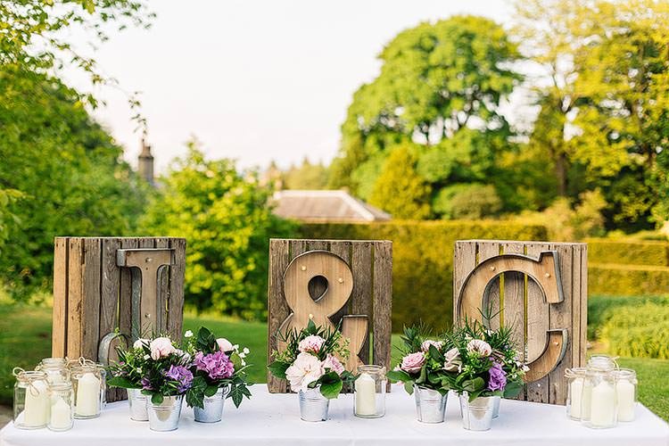 Wooden Letter Lights Pot Plants Decor Delightful Secret Garden Wedding http://www.pauljosephphotography.co.uk/