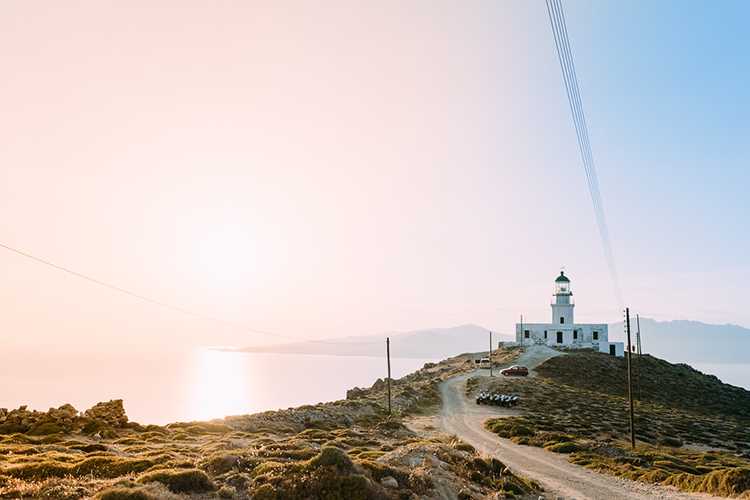 Ceremony Venue Armenistis Lighthouse Grass Ocean Sunset Breathtaking Intimate Mykonos Destination Wedding http://www.annapumerphotography.com/