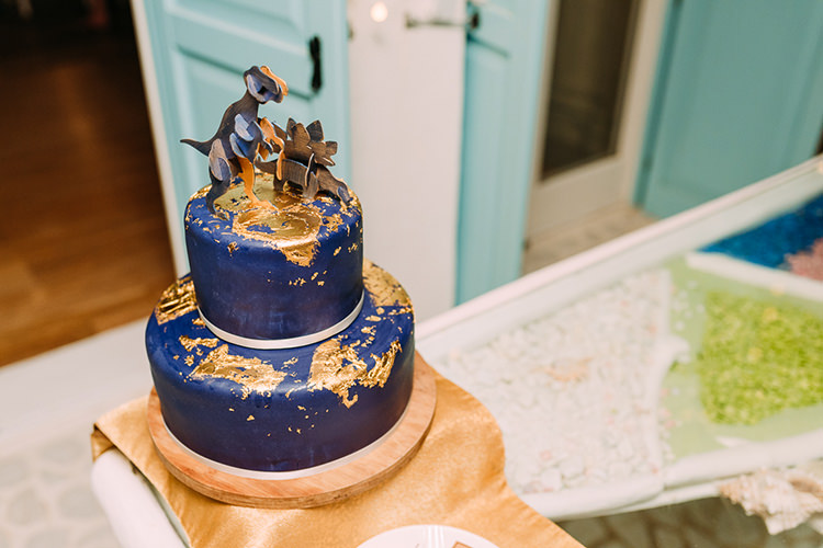 Wedding Cake Navy Gold Dinosaur Cake Topper Wooden Stand Breathtaking Intimate Mykonos Destination Wedding http://www.annapumerphotography.com/