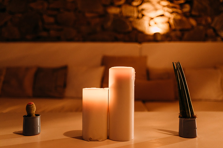 Reception Candle Light Cactus Stone Wall Couch Breathtaking Intimate Mykonos Destination Wedding http://www.annapumerphotography.com/