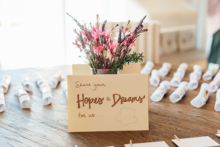 Hopes and Dreams Sign Cards Pegs Pink Purple Flowers Vase Party Crackers Breathtaking Intimate Mykonos Destination Wedding http://www.annapumerphotography.com/
