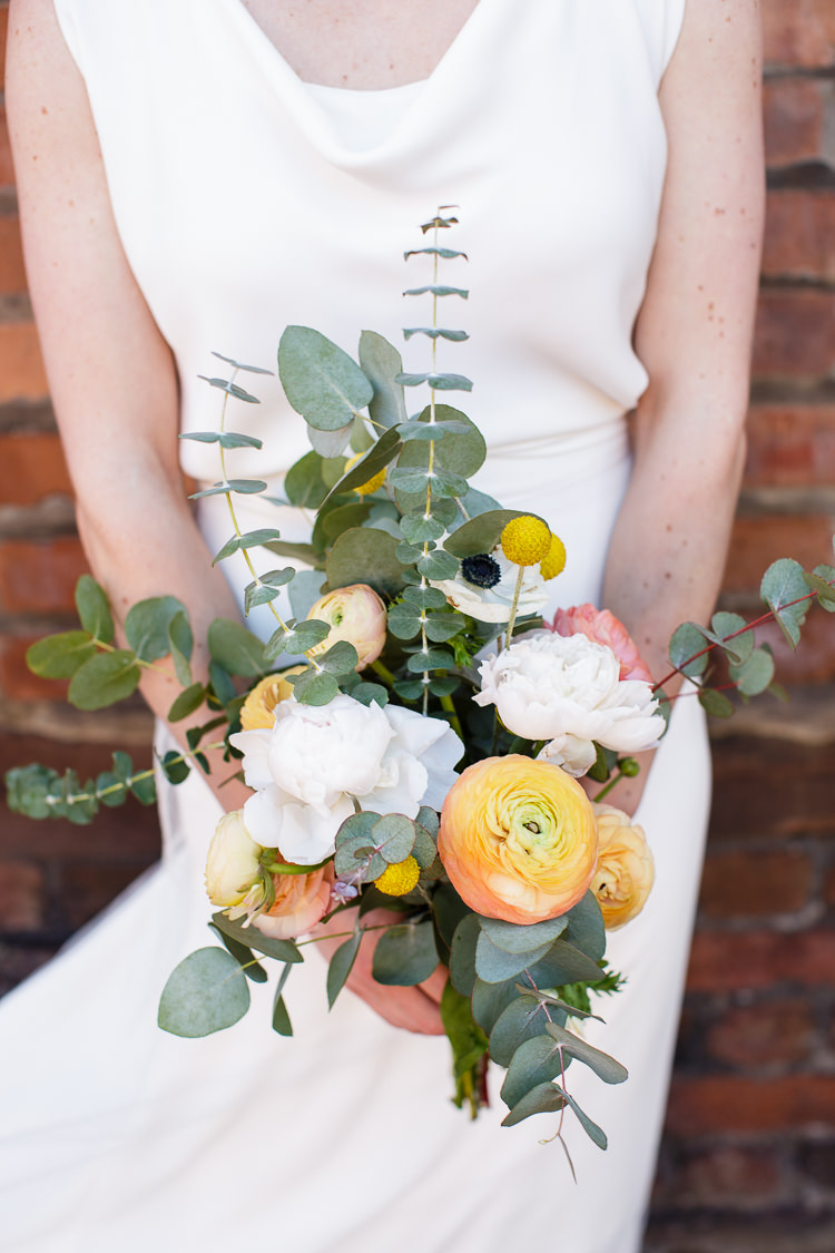 Bouquet Flowers Bride Bridal Orange Coral Ranunculus Creative DIY Industrial Warehouse Wedding http://www.michellehill.ca/