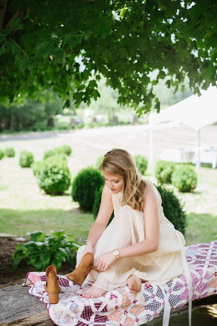 Bride Chiffon Bridal Gown Loose Curls Hairstyle Tan Boots Blanket Trees Plants Rustic Woodsy Wedding North Carolina http://abbyleighanne.com/