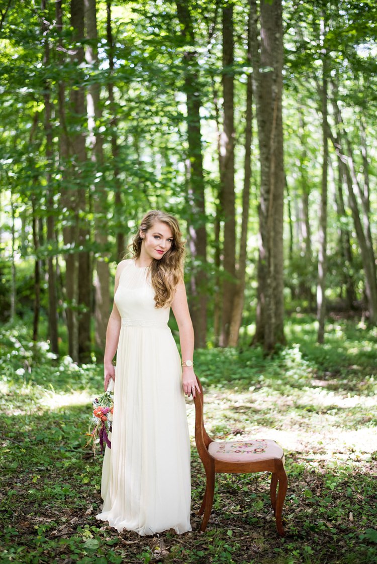 Bride Chiffon Bridal Gown Loose Curls Hairstyle Bouquet Vintage Wooden Chair Trees Grass Rustic Woodsy Wedding North Carolina http://abbyleighanne.com/