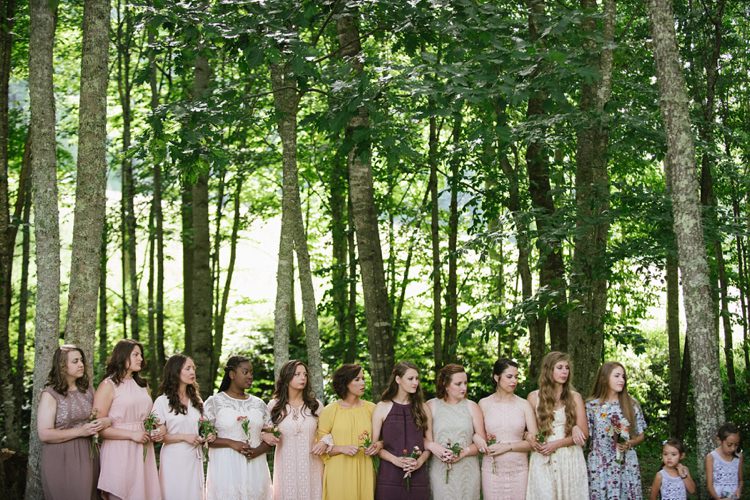 Outdoor Ceremony Bridesmaids Multicoloured Dresses Bouquets Tall Trees Rustic Woodsy Wedding North Carolina http://abbyleighanne.com/
