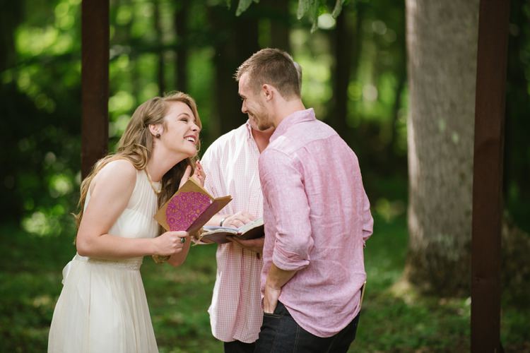 Outdoor Ceremony Bride Chiffon Bridal Gown Groom Pink Shirt Ceremony Booklet Trees Rustic Woodsy Wedding North Carolina http://abbyleighanne.com/