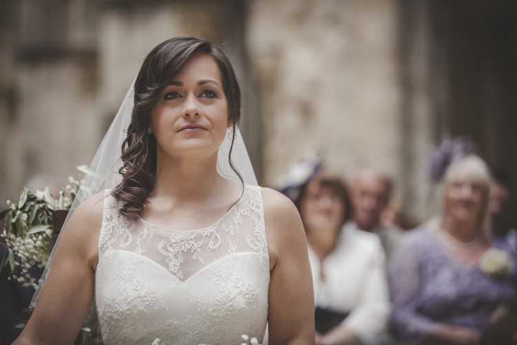 Outdoor Ceremony Bride Lace Sleeveless Bridal Gown Loose Curls Veil Guests Atmospheric Abbey Tuscany Wedding http://www.angelicabraccini.com/