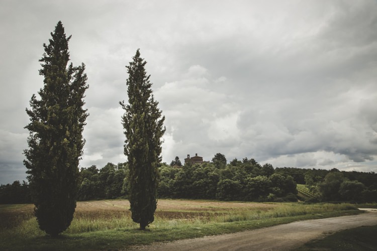 Green Trees Grass Dirt Road Cloudy Skies Atmospheric Abbey Tuscany Wedding http://www.angelicabraccini.com/