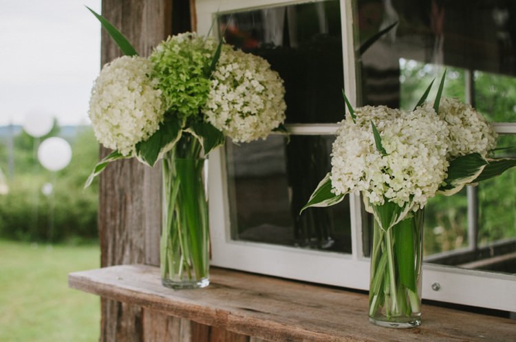 White Hydrangeas Glass Vases Florals Wooden Hut Romantic Fresh Outdoor Wedding Ontario http://www.rebeccabose.com/