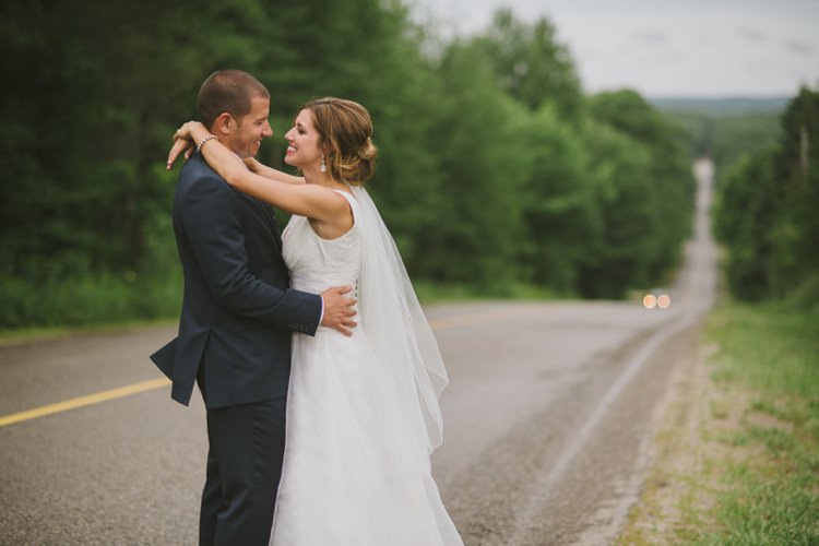 Bride Lace V Neck Bridal Gown Veil Groom Navy Suit Light Blue Tie Trees Road Romantic Fresh Outdoor Wedding Ontario http://www.rebeccabose.com/
