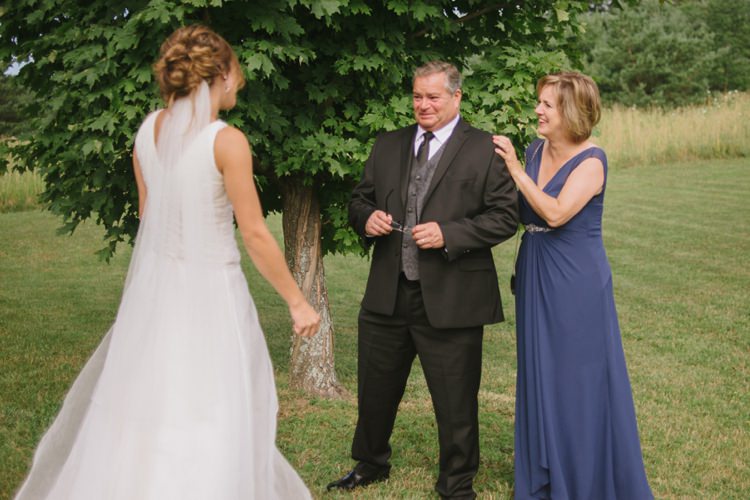 Bride Lace V Neck Bridal Gown Veil Parents Happy Tears Grass Trees Romantic Fresh Outdoor Wedding Ontario http://www.rebeccabose.com/
