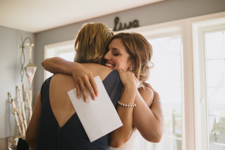 Bride Guest Hug Letter Smiles Romantic Fresh Outdoor Wedding Ontario http://www.rebeccabose.com/